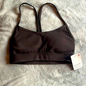 NWT, black Flow Y Niki sports bra, Lululemon, sz 2